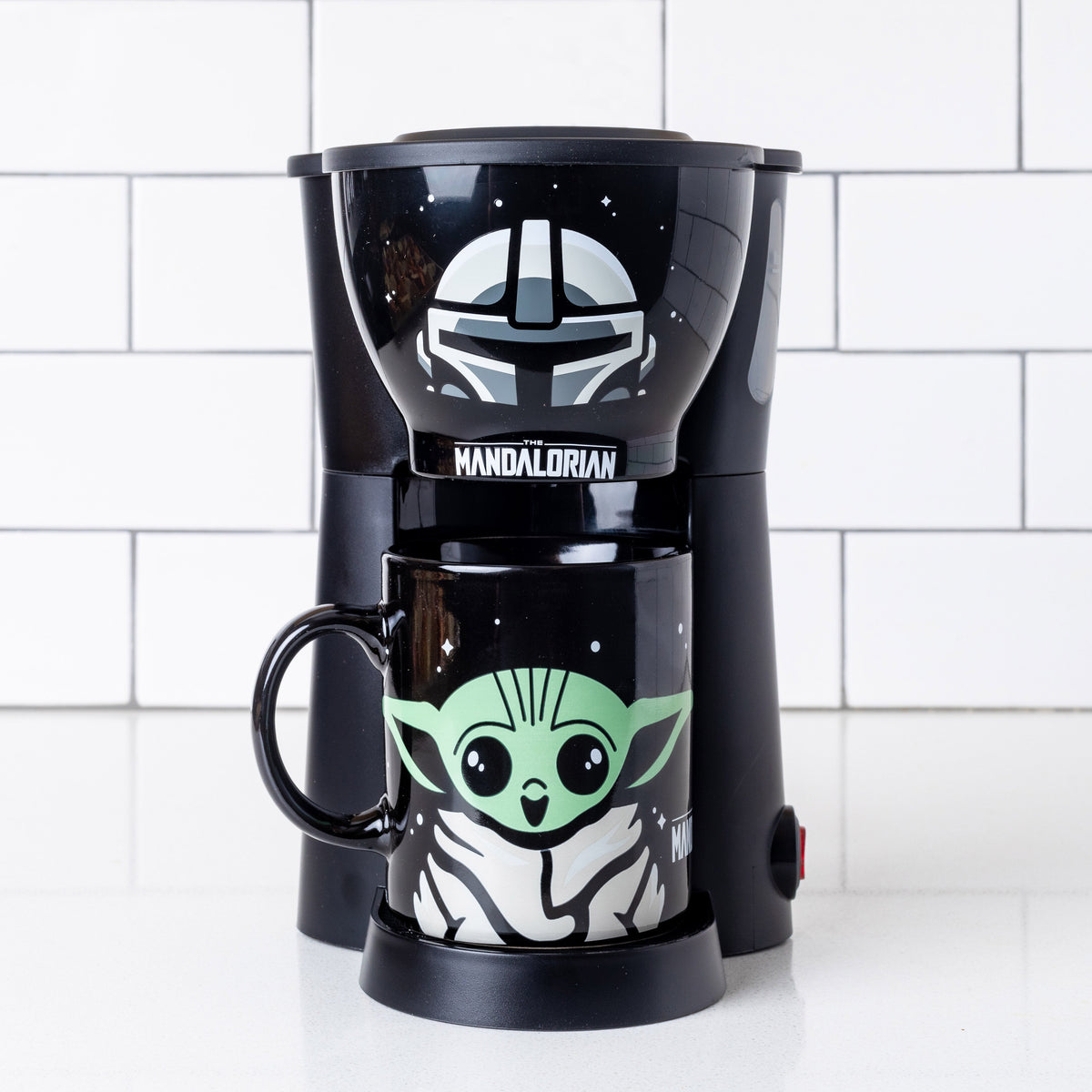 http://mycollectorsoutpost.com/cdn/shop/products/Din-Djarin-and-the-child-grogu-star-wars-the-mandalorian-kitchen-single-cup-coffee-maker-with-baby-yoda-mug-17_1200x1200.jpg?v=1645305653