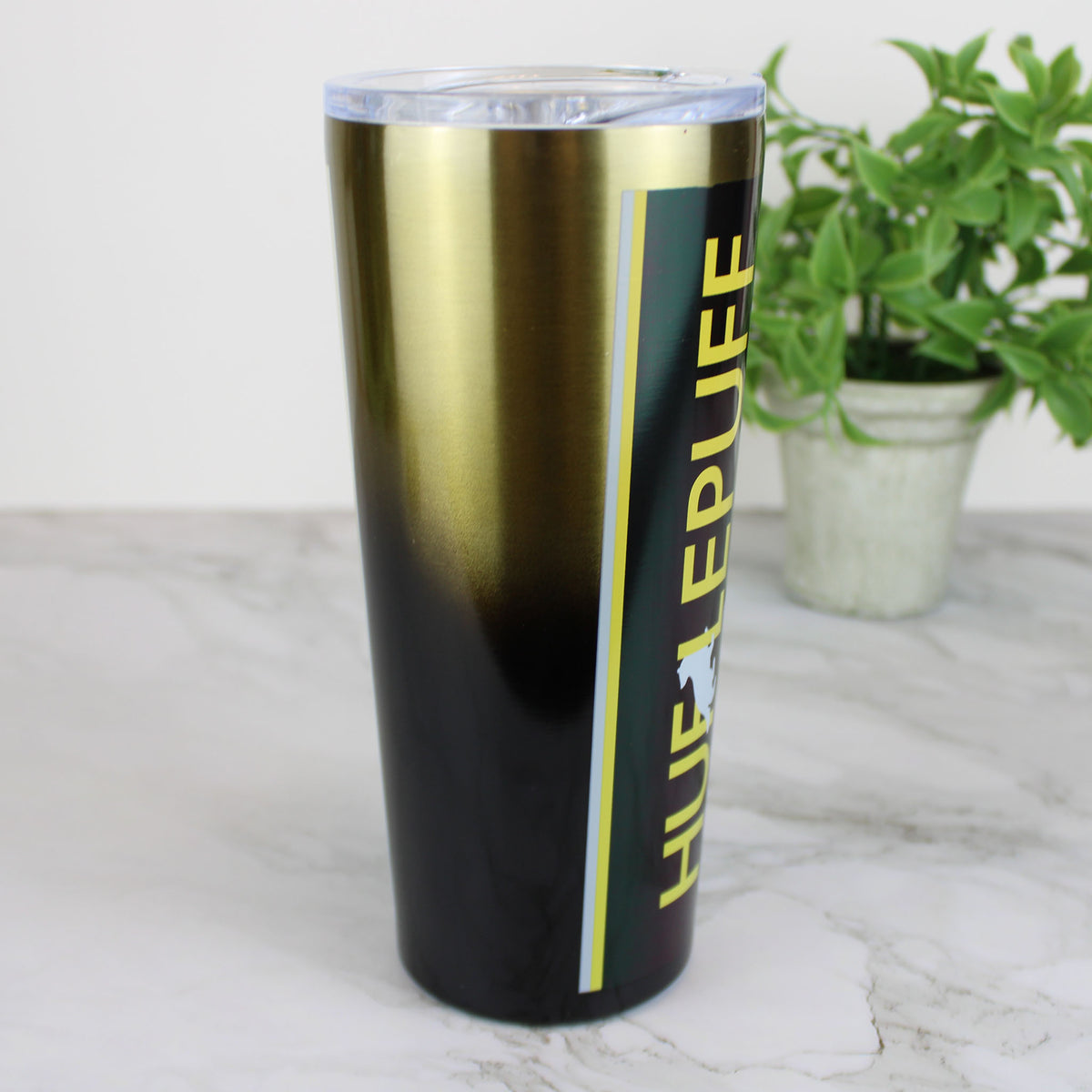 http://mycollectorsoutpost.com/cdn/shop/products/hufflepuff-harry-potter-22-oz-stainless-steel-travel-tumbler2_1200x1200.jpg?v=1674237231