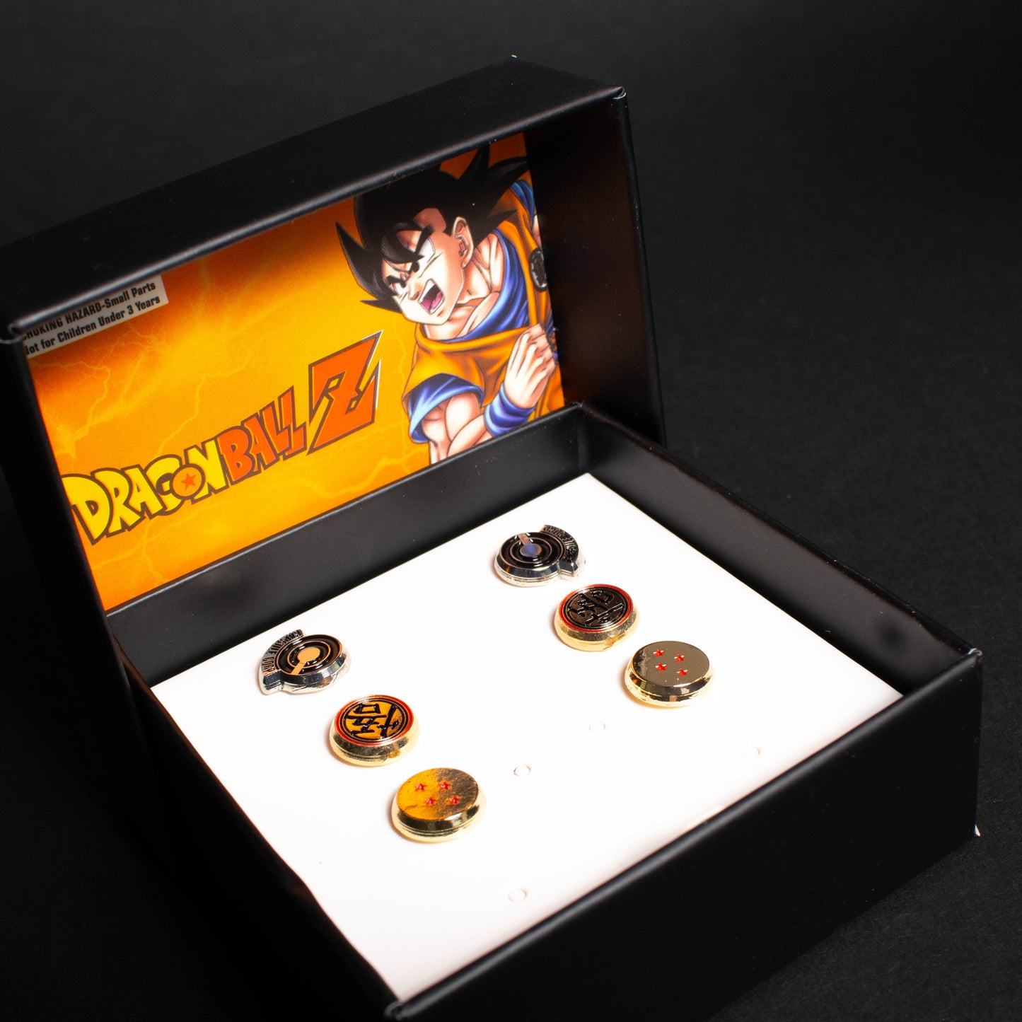 Load image into Gallery viewer, Dragon Ball Capsule Corp Stud Earrings
