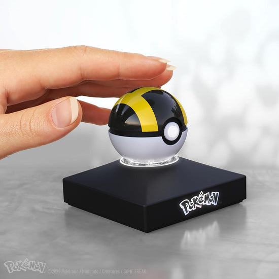 The Wand Company Mini Ultra Ball Authentic Replica - Realistic, Electronic, Die-Cast Poké Ball with Display Stand Light Features 