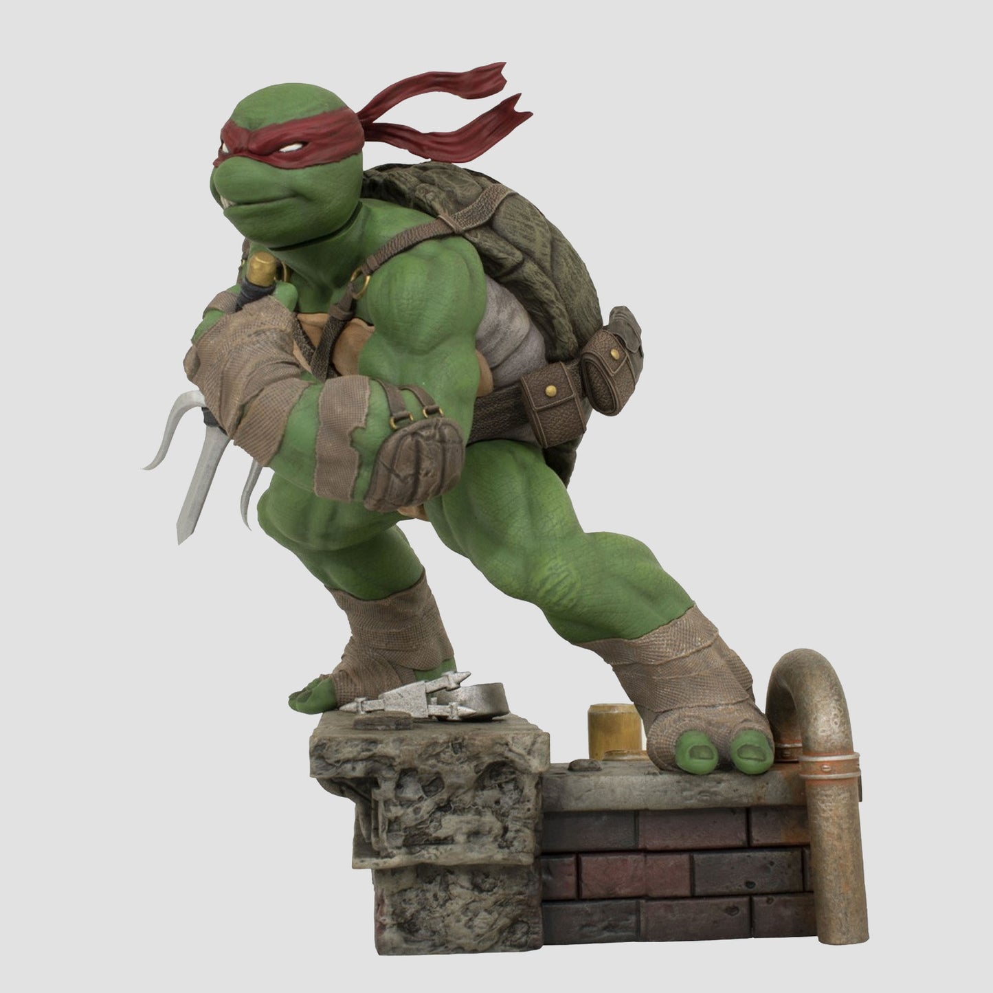https://mycollectorsoutpost.com/cdn/shop/files/raphael-teenage-mutant-ninja-turtles-gallery-statue1_1445x.jpg?v=1701106603