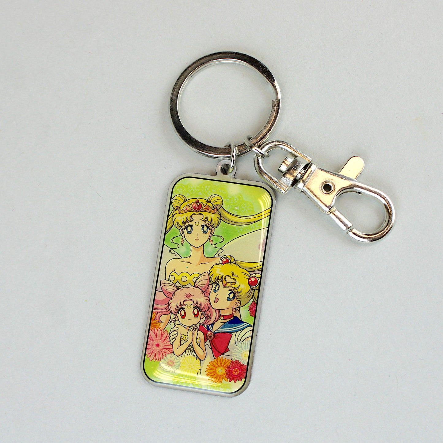 Load image into Gallery viewer, Serenity, Moon, &amp;amp; Chibiusa (Sailor Moon S) Metal Keychain
