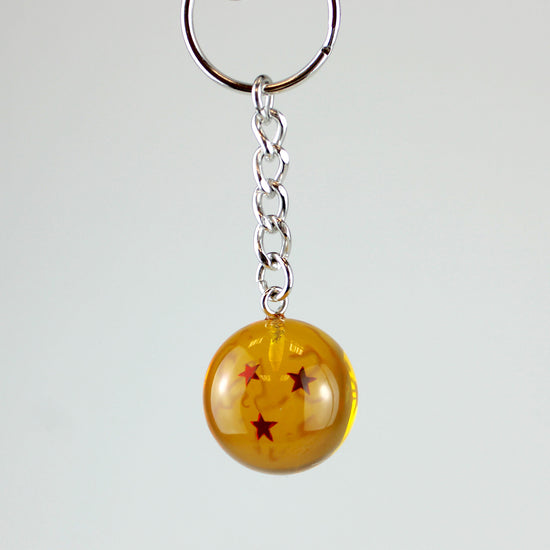 Load image into Gallery viewer, Three Star Dragon Ball (Dragon Ball Z) Acrylic Mini Replica Keychain
