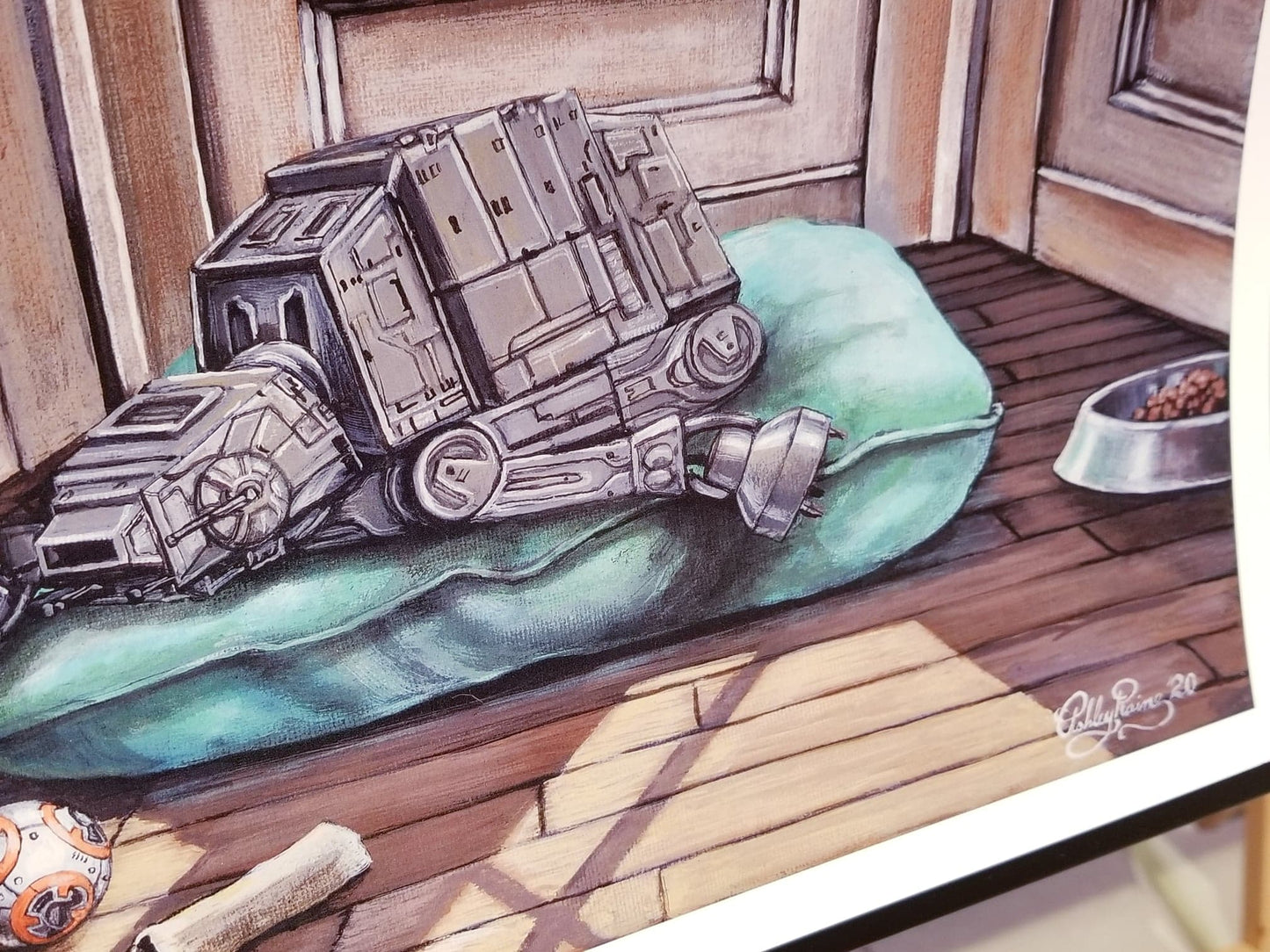 "Imperial Pupper" Star Wars Parody Art Print by Ashley Raine  Who's a good AT-AT? This boy is, and he's taking a well deserved puppy nap by the window! This Star Wars parody art is perfect for Imperial War Machine lovers and Sith Sympathizers of course, but also for any Star Wars fan who loves their fur-babies!    Details to Enjoy: Pup has a Wookiee toy with a torn-off arm, a bone, a comfy bed, and a well loved BB-8 chewy toy for only the best of good boys.