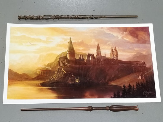 "Welcome to Hogwarts" Harry Potter Art by Christopher Clark  Stunning licensed art print of the Hogwarts castle at sunset. The Hogwarts Express is arriving, an owl flies overhead, and Hagrid's Hutt can be seen.  Fully licensed fine art print, sized 10" x 18" on premium paper