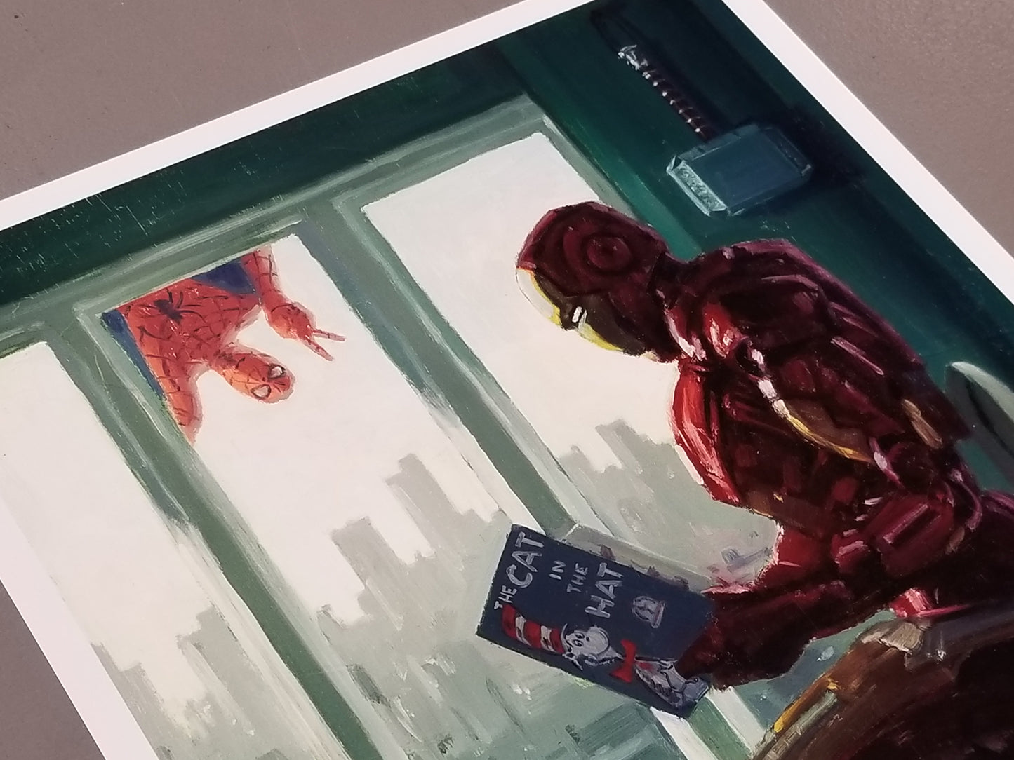 "I need it." - Tony Stark  Iron Man Marvel Parody Art Print by Bucket Art.  Cool Things: ﻿Thor's Hammer hanging on wall, Spider-Man photo bombing, Iron Man is reading "Cat in the Hat."  ﻿Did You Know? ﻿Tom Holland signed the Original & owns a canvas.   Print Size: 16" x 12" on Premium Archival Paper