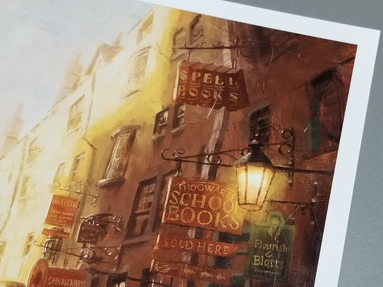 Load image into Gallery viewer, &amp;quot;Diagon Alley&amp;quot; Harry Potter Art Print by Christopher Clark  Welcome to Diagon Alley. Peek at Ollivander’s, or the Dailey Prophet. Gringotts Wizarding Bank is just down the street. There is a small sign pointing the way to Knockturn Alley, peek closely to spot a few of our favorite characters, and much more…
