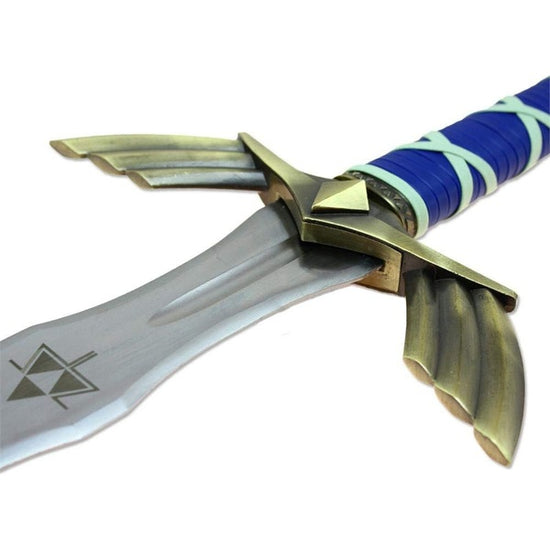 steel replica inspired by Link's Master Sword, from the The Legend of Zelda series!   This stunning full-steel replica based on the Master Sword features an incredible steel hilt design with a blue faux leather wrapped handgrip and incredible genuine leather scabbard with gold Hyrule design. The sword is two-handed length and featuring laser-engraved Triforce and Hylian runes on the blade. 