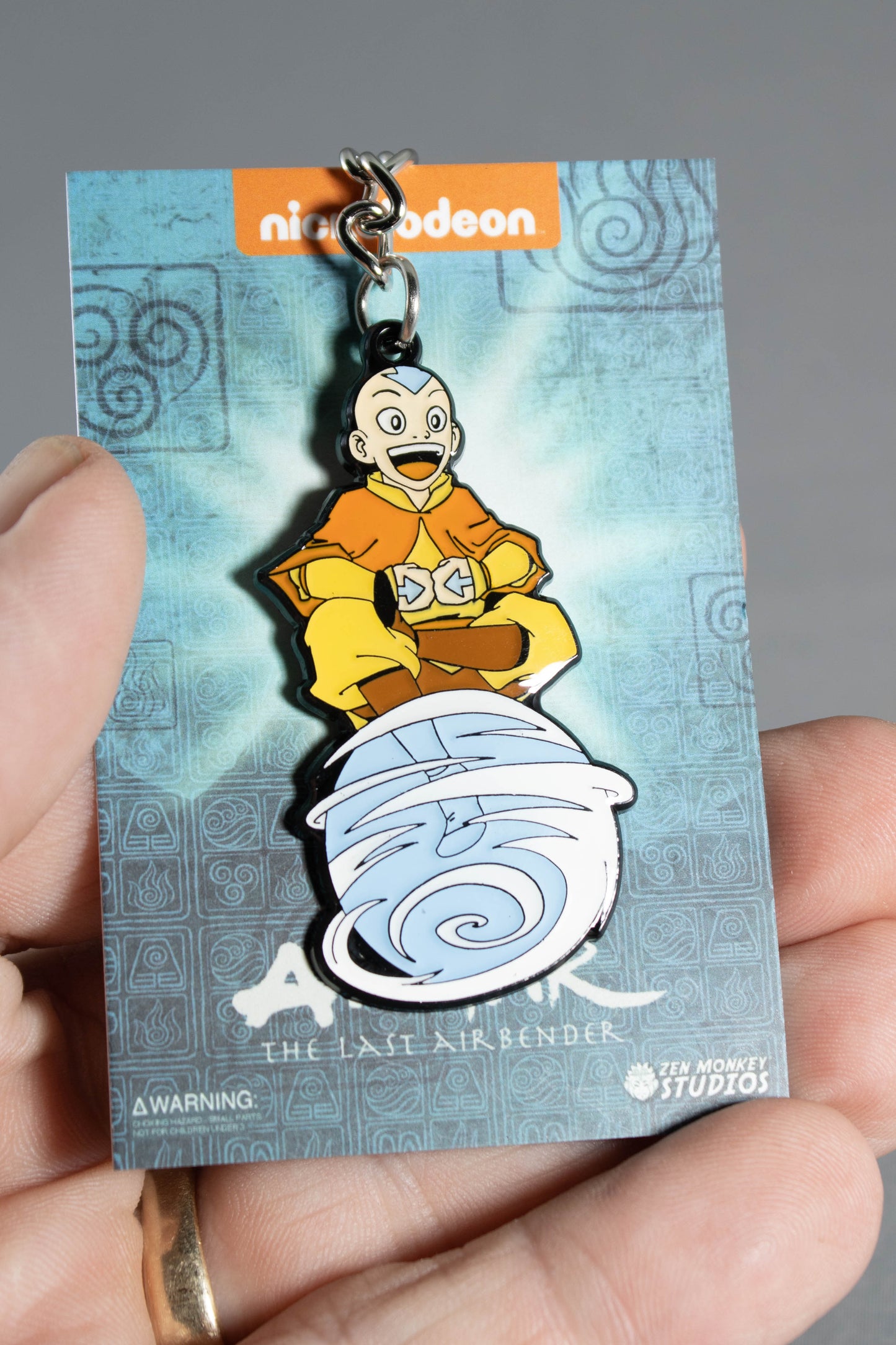 Load image into Gallery viewer, Aang on Air Scooter (Avatar: The Last Airbender) Metal Enamel Keychain
