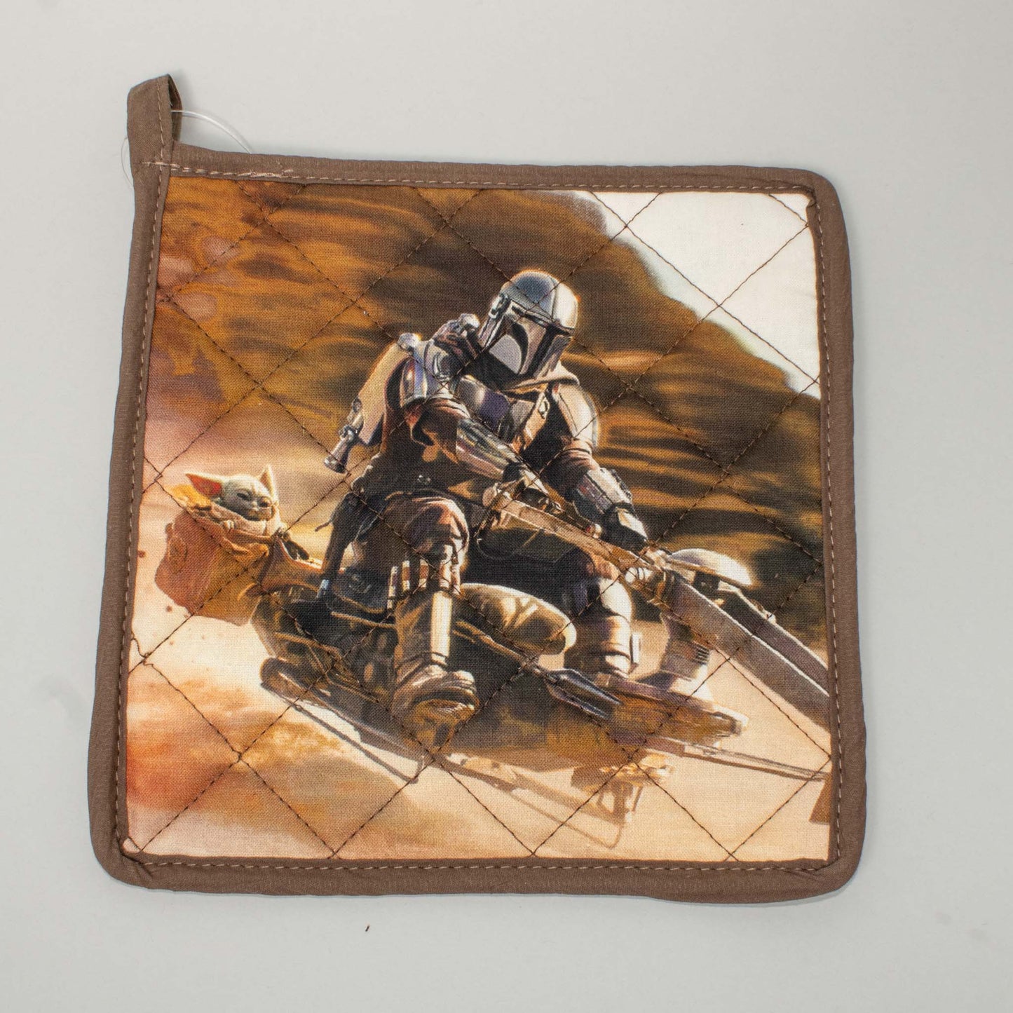 Load image into Gallery viewer, Din Djarin and Grogu on Speeder Bike (Star Wars: The Mandalorian) Quilted Pot Holder
