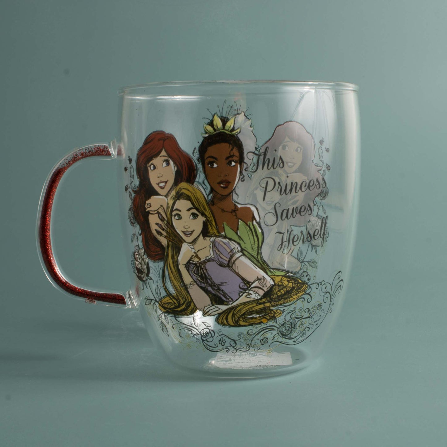 https://mycollectorsoutpost.com/cdn/shop/products/Disney-Princess-_This-Princess-Saves-Herself_-Decorative-Glass-cup-2_1445x.jpg?v=1645634182