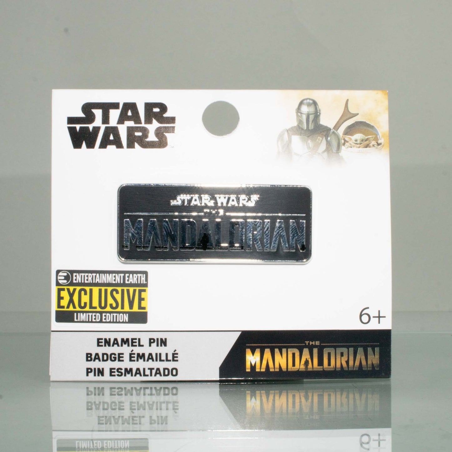 https://mycollectorsoutpost.com/cdn/shop/products/Sta-Wars-The-Mandalorian-Logo-EE-Exclusive-Enamel-Pin-by-Loungefly_1445x.jpg?v=1646260645