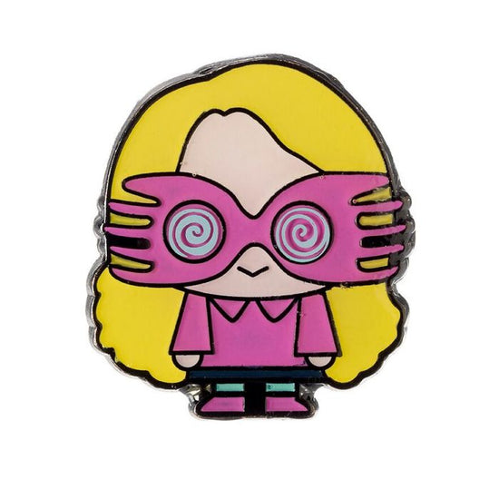 Luna Lovegood Pin Badge  This Harry Potter Pin Badge has been created using the official style guide from Warner Bros.  Enamel Pin Details:  Around .75" tall and .5" wide (20mm x 16mm) Beautiful colors protected by a high-gloss finish Enamel pin arrives on a printed Harry Potter card backer Quality metal badge pin with butterfly clutch backing