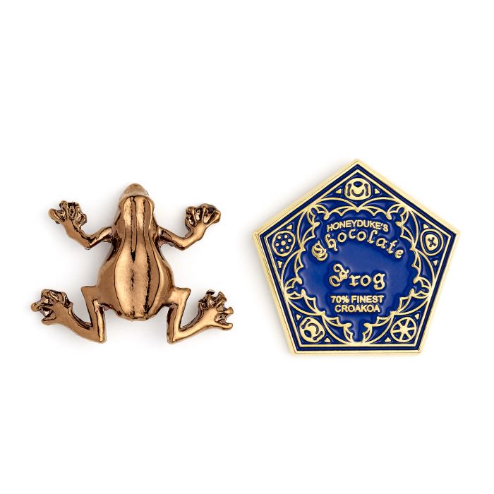 Load image into Gallery viewer, Chocolate Frog design.  The Chocolate Frog was the magical confectionery, first seen in Harry Potter and The Philosophers Stone that came packaged with enchanted collectable cards featuring famous Witches and Wizards.  Enamel Pin Details:  Around .75&amp;quot; tall and .5&amp;quot; wide Beautiful colors protected by a high-gloss finish Arrives on a printed Harry Potter card backer Quality metal badge pin with butterfly clutch backing
