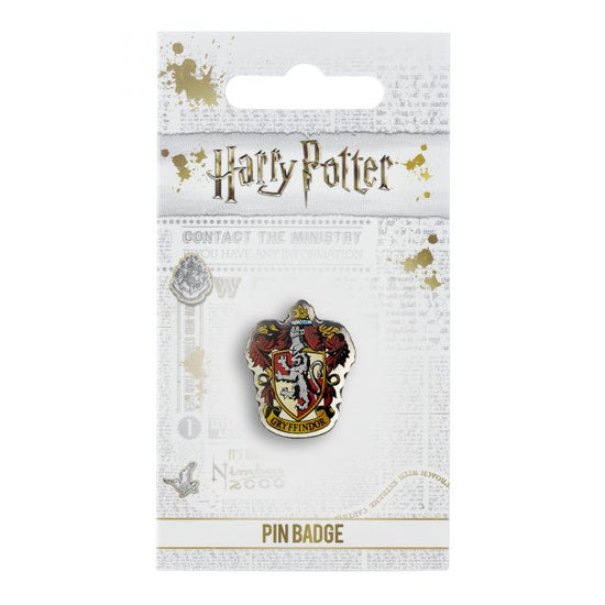 Load image into Gallery viewer, Gryffindor Crest Pin Badge  The Crest of the famous Hogwarts house, founded by Godric Gryffindor  This Harry Potter Pin Badge has been created using the official style guide from Warner Bros.  Enamel Pin Details:  Around .75&amp;quot; tall and .5&amp;quot; wide (20mm x 16mm) Beautiful colors protected by a high-gloss finish Enamel pin arrives on a printed Harry Potter card backer Quality metal badge pin with butterfly clutch backing
