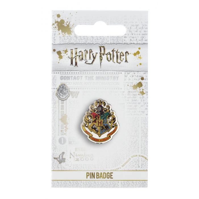 Official Harry Potter Hogwarts Crest Pin Badge  The Crest of the famous School of Witchcraft and Wizardry  This Harry Potter Pin Badge has been created using the official style guide from Warner Bros.  Enamel Pin Details:  Around .75" tall and .5" wide (20mm x 16mm) Beautiful colors protected by a high-gloss finish Enamel pin arrives on a printed Harry Potter card backer Quality metal badge pin with butterfly clutch backing