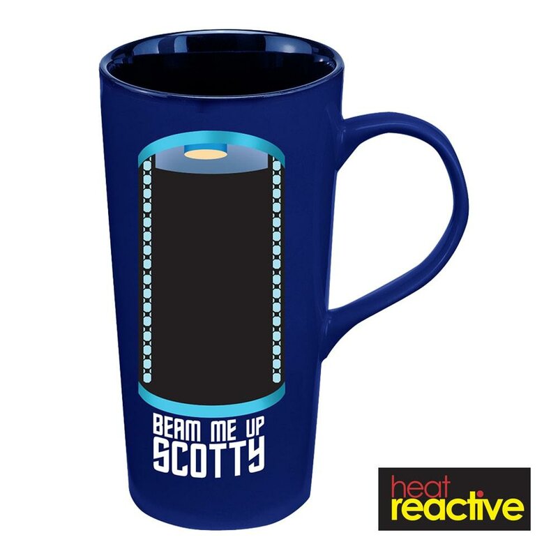Don't leave the Enterprise for a mission without your favorite beverage! With this Star Trek Beam Me Up Scotty 20 oz. Heat Reactive Ceramic Travel Mug, you'll get to travel around with Captain Kirk on missions abroad.  Along with the words, "Beam me up, Scotty," this fantastic mug features a heat reactive design - when you add hot liquid, Captain James T. Kirk appears in the Transporter!  Holds up to 20 ounces of liquid. Heat reactive design changes when filled with hot liquid