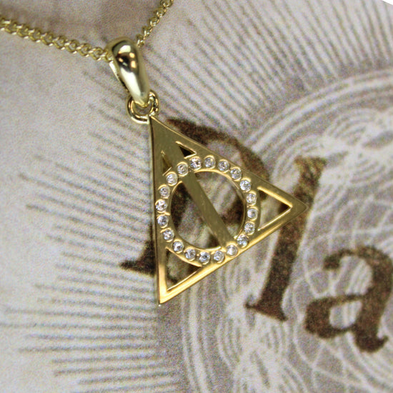 Amazon.com: Harry Potter Womens Deathly Hallows Necklace - 18-inch Chain  Necklace for Women Jewelry : Clothing, Shoes & Jewelry