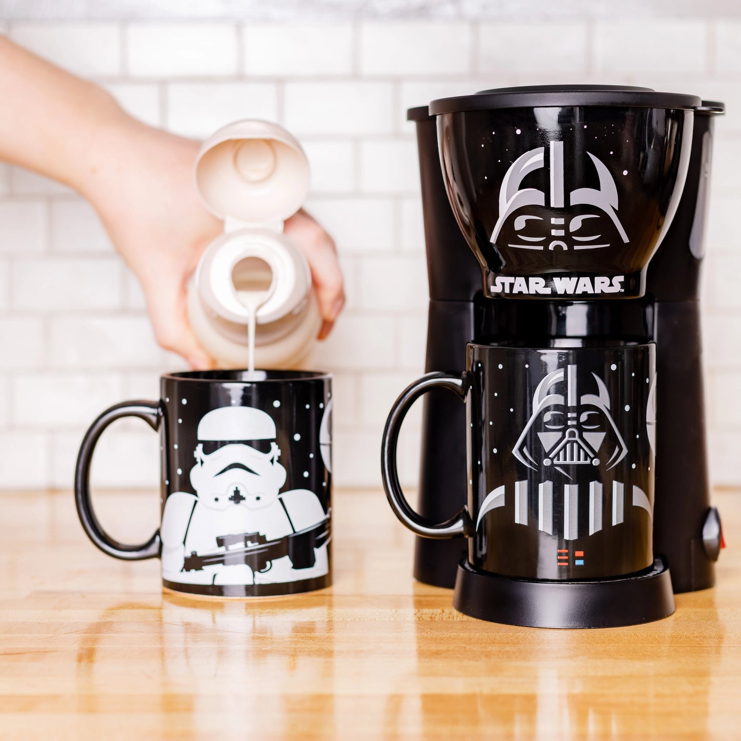 https://mycollectorsoutpost.com/cdn/shop/products/stormtrooper-and-darth-vader-star-wars-sith-the-empire-dark-side-kitchen-coffee-maker-gift-set-with-two-mugs_1445x.webp?v=1654272976
