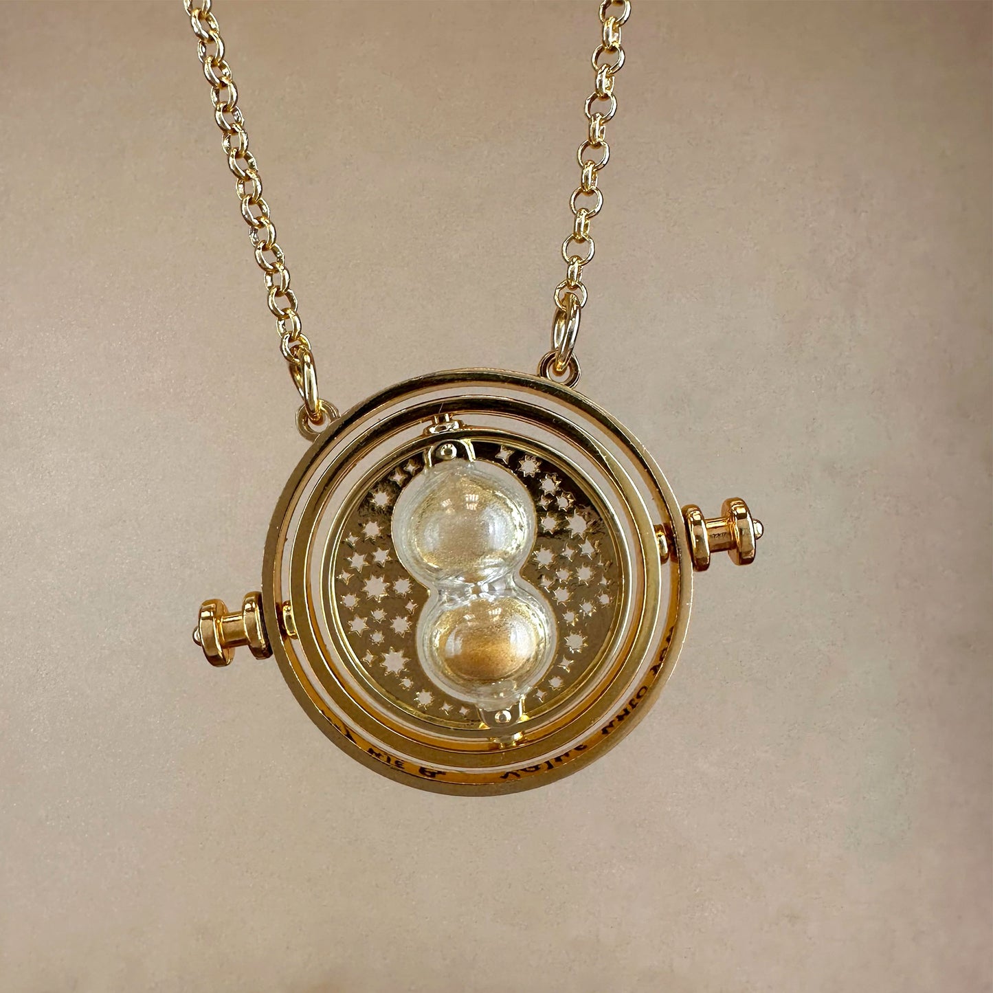 Buy Harry Potter Gold Colour Time Turner Pendant Necklace | Womens  necklaces | Argos